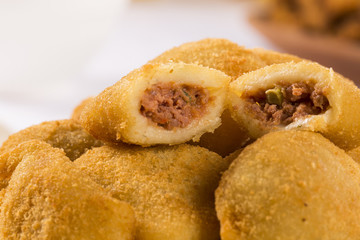Rissole - Meat rissole served with chili sauce.