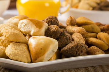 Mixed brazilian snack on the table.