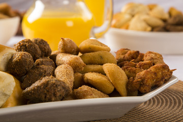 Mixed brazilian snack on the table.
