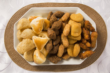 Mixed brazilian snack on the table.