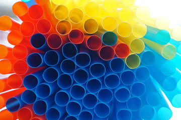 Colorful drinking straws close-up background