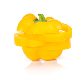 Yellow bell peppers cut pieces on white background.