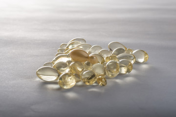Gel capsules on the white background.