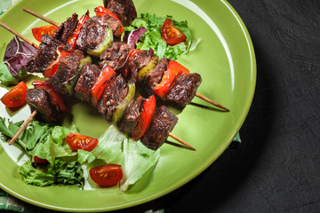 Grilled beef meat and vegetable kebabs