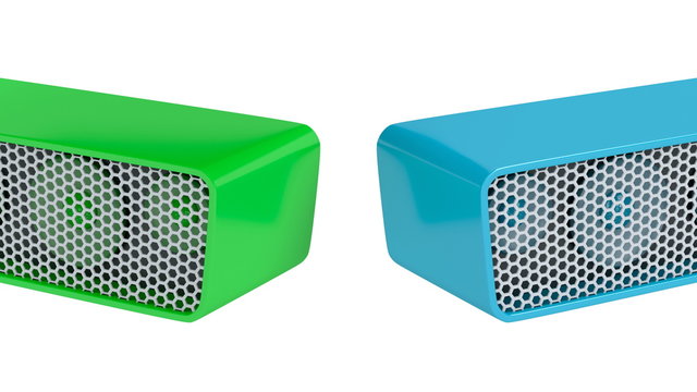 Colorful wireless speakers on white background