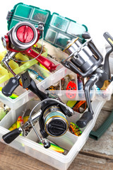 fishing tackles and baits in box