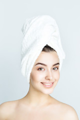 beautiful woman with white towel on his head. Spa Woman. Beautiful Girl After Bath. Perfect Skin. Skincare. Young Skin