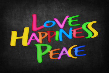 Obraz premium Love Happiness Peace word on Blackboard