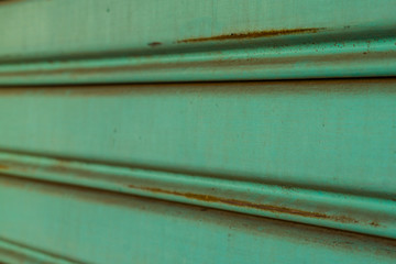 Close up of old and dirty corrugated of mint metal sheet slide d