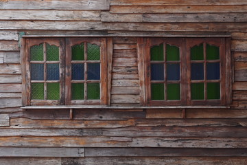 Old wooden house with windows 