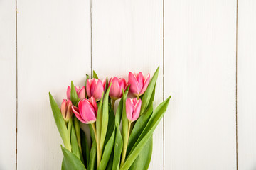 Pink Spring Tulips On White Wood Table