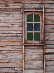 Old wooden house with windows