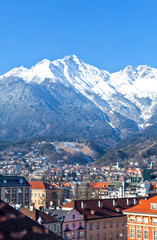 Austria, Tyrol, panoramic wiew over Innsbruck and Inn valley with the snowy mountains in the background