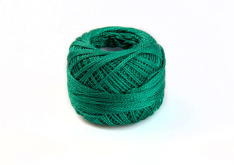 Ball of sea  green yarn, ball of wool isolated on white background