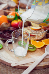 Beautiful breakfast. Milk, bread and croissant.