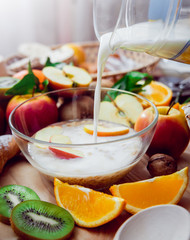 Beautiful breakfast. Milk,fruits, bread