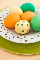 Colorful painted Easter eggs on a table