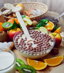 Beautiful breakfast. Milk,fruits, bread