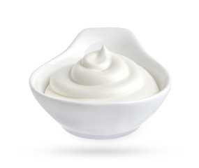 Bowl of mayonnaise isolated on white background