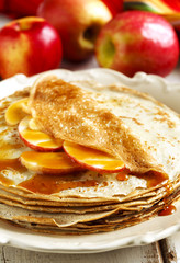 Crepes with apple and caramel sauce