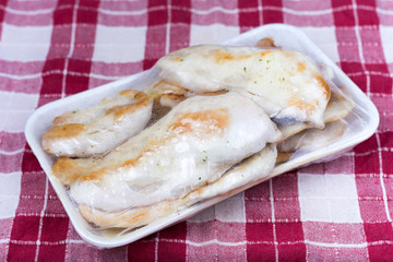 Chicken breasts fryed and packed