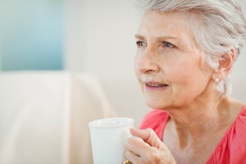 Senior woman drinking a cup of coffee