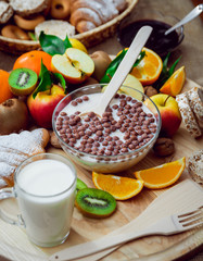 Beautiful breakfast. Milk,fruits, bread