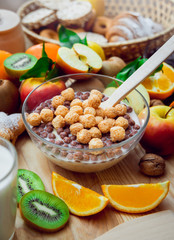Beautiful breakfast. Milk,fruits, bread