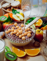 Beautiful breakfast. Milk,fruits, bread