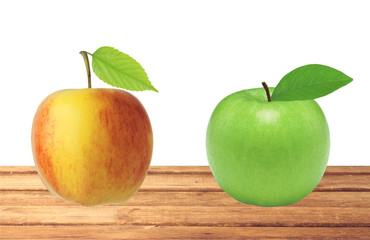 yellow and green apple fruits with green leaves on table isolate