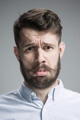 Obraz premium Close up face of discouraged man 