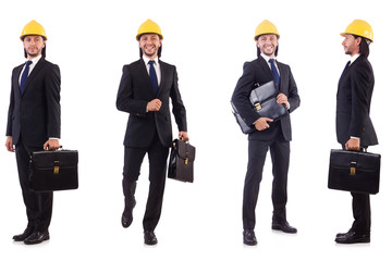 Young architect wearing hardhat on white