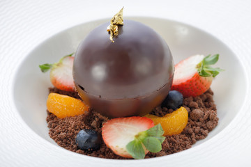 Chocolate Ball dessert with ice cream inside