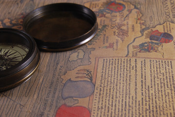 vintage shabby compass and old map