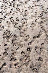 Footprints on sand.