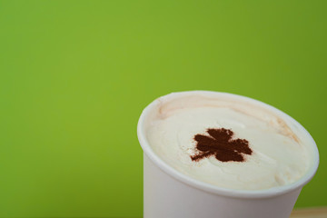 take away cup with shamrock symbol