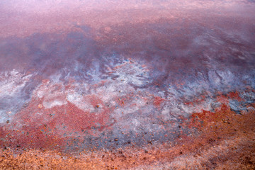 Close-up view on the ocean water on the salt pools on natural manufacturing on La Palma island in Spain