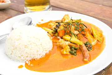 Spicy fried squid with red curry and vegetables, Thai food