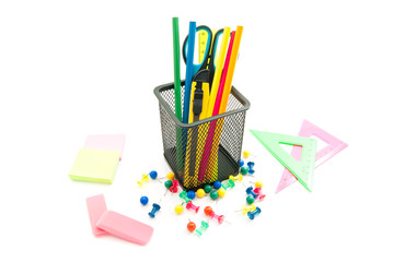 erasers and other office stationery on white