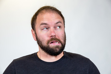 Fototapeta premium Man in Mid 30s Poses for Studio Portrait