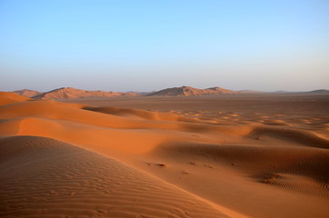 Panoramic view of sand dunes in Oman