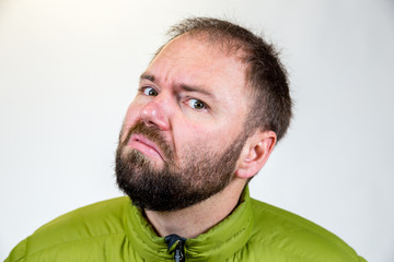 Obraz premium Man in Mid 30s Poses for Studio Portrait