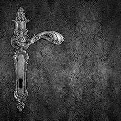 old handle on black plate background