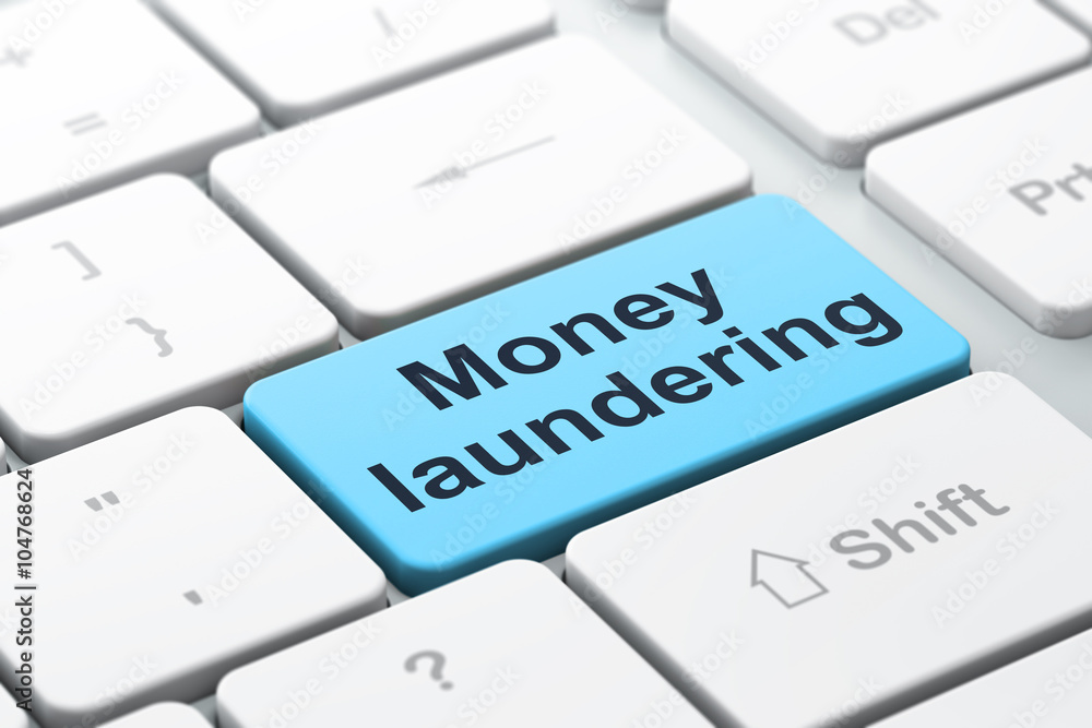 Poster currency concept: money laundering on computer keyboard background