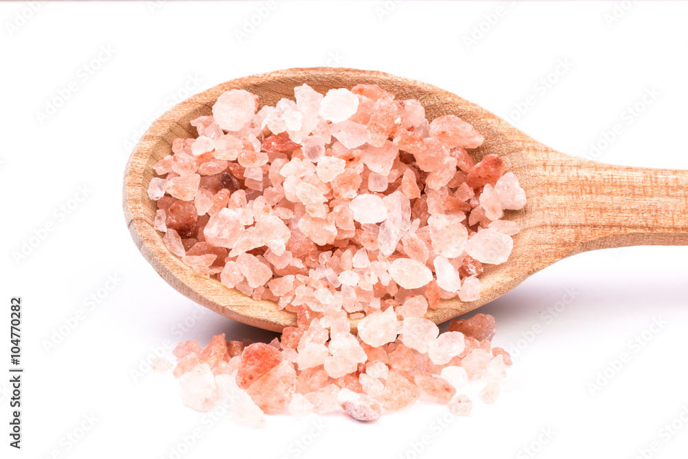 Wall mural himalayan pink salt isolated on white