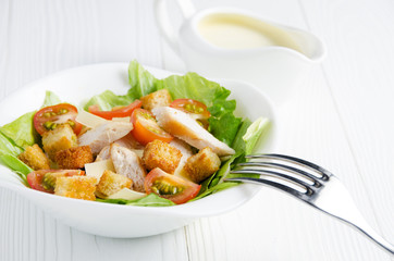 Caesar salad with sauce closeup