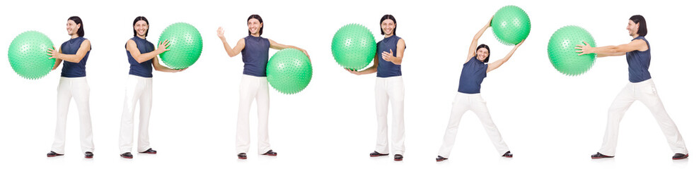 Fototapeta premium Man with swiss ball isolated on white