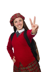 Girl in scottish tartan clothing isolated on white