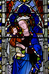 Fototapeta na wymiar Mother Mary with baby Jesus in stained glass
