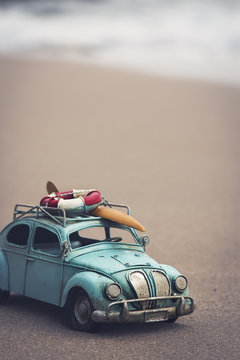 Fototapeta Miniature car in the beach